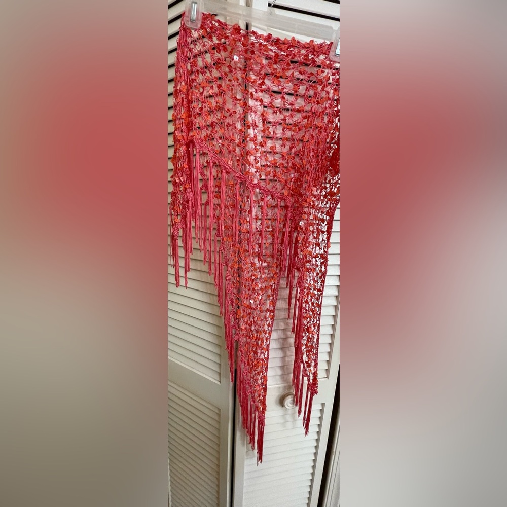 Women’s coral crocheted shawl with sequins. 70” long.